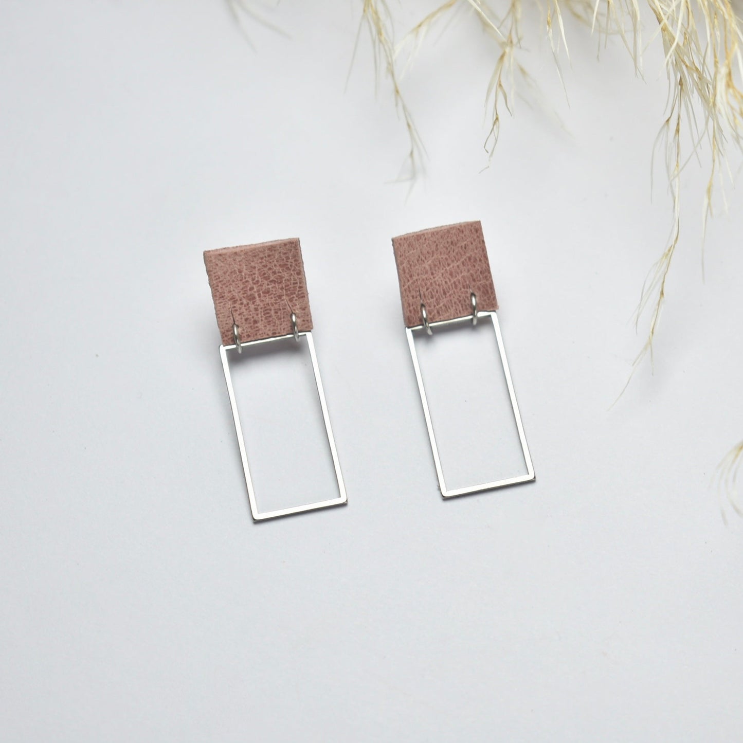 Handmade, light weight and comfortable to wear all day long leather earrings. All our earring hooks are made with a high quality stainless steel and they are hypo allergenic.  They will not tarnish or irritate your sensitive skin.