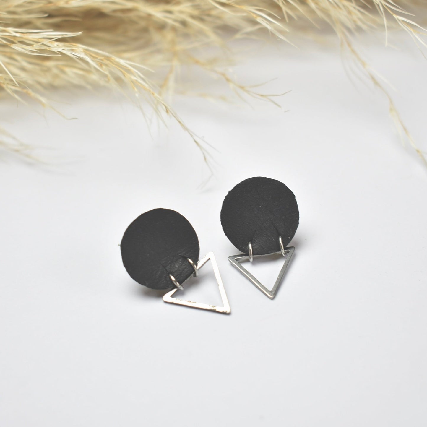 Handmade, light weight and comfortable to wear all day long leather earrings. All our earring hooks are made with a high quality stainless steel and they are hypo allergenic.  They will not tarnish or irritate your sensitive skin.