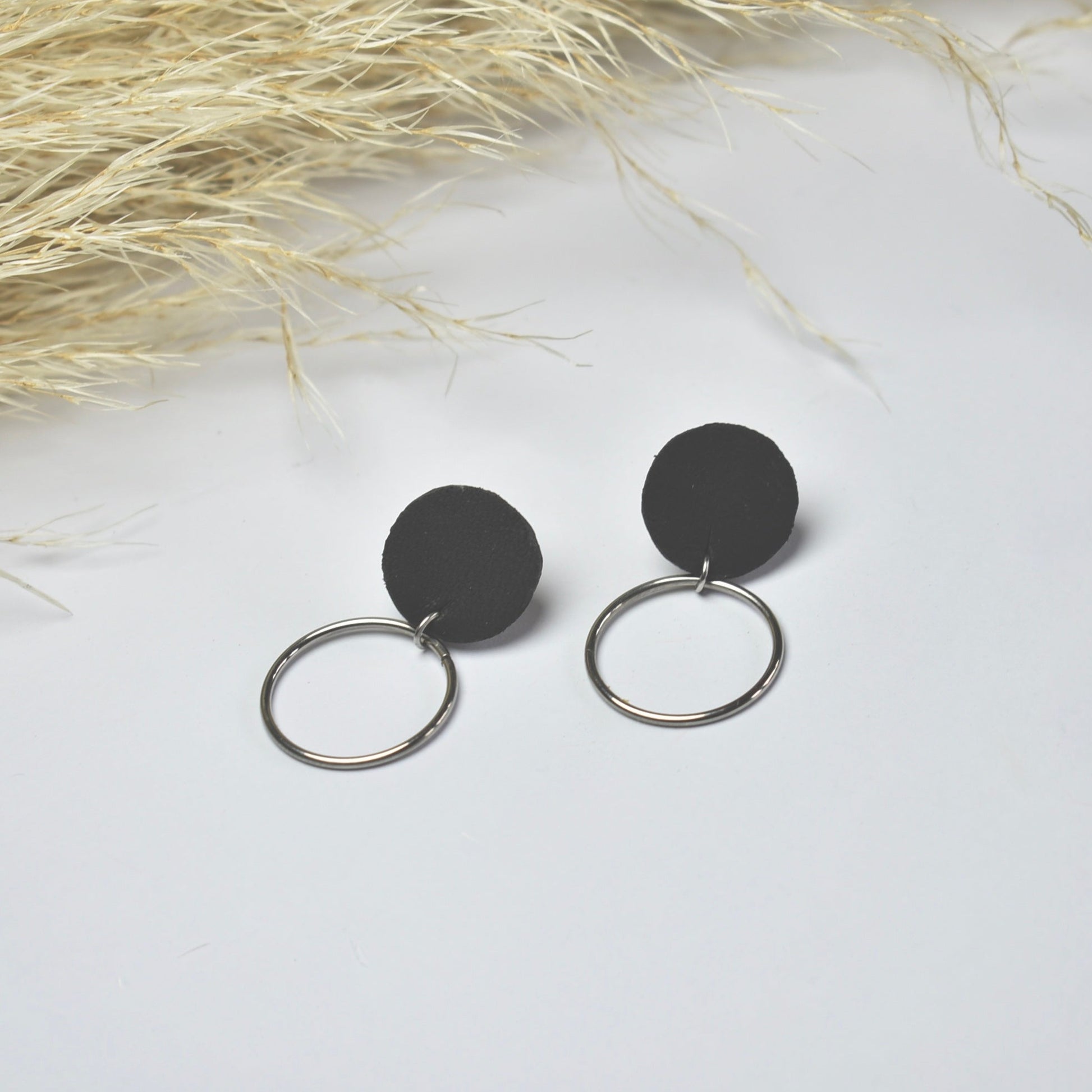 Handmade, light weight and comfortable to wear all day long leather earrings. All our earring hooks are made with a high quality stainless steel and they are hypo allergenic.  They will not tarnish or irritate your sensitive skin.