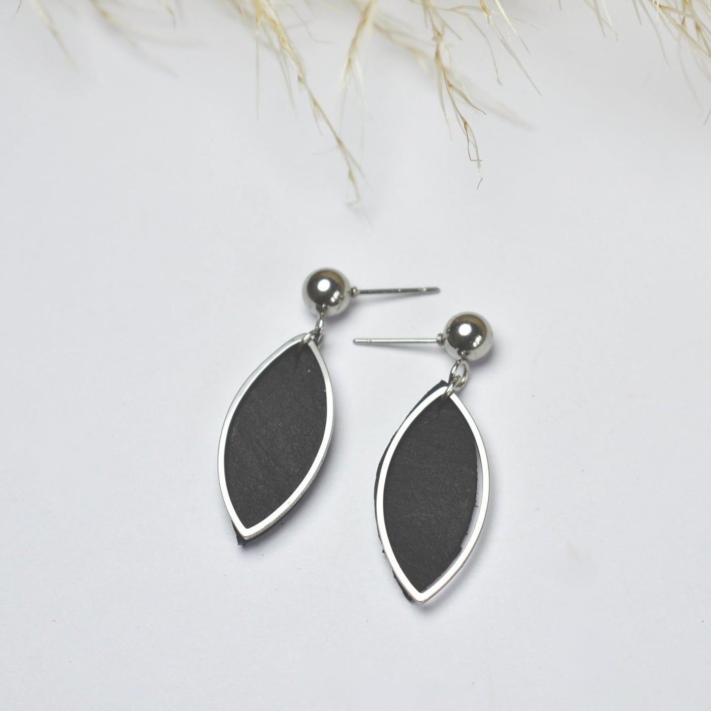 Handmade, light weight and comfortable to wear all day long leather earrings. All our earring hooks are made with a high quality stainless steel and they are hypo allergenic.  They will not tarnish or irritate your sensitive skin.