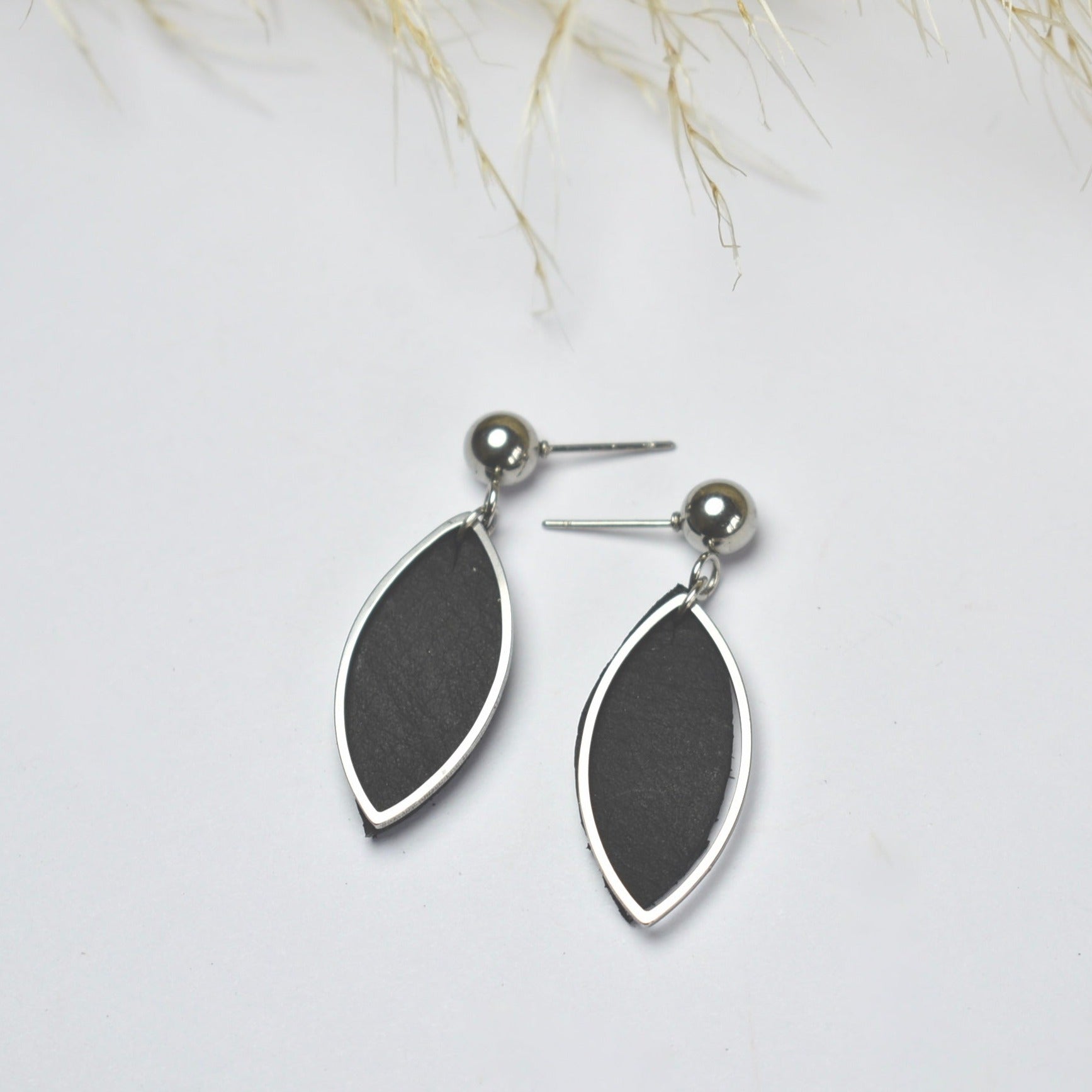 Handmade, light weight and comfortable to wear all day long leather earrings. All our earring hooks are made with a high quality stainless steel and they are hypo allergenic.  They will not tarnish or irritate your sensitive skin.