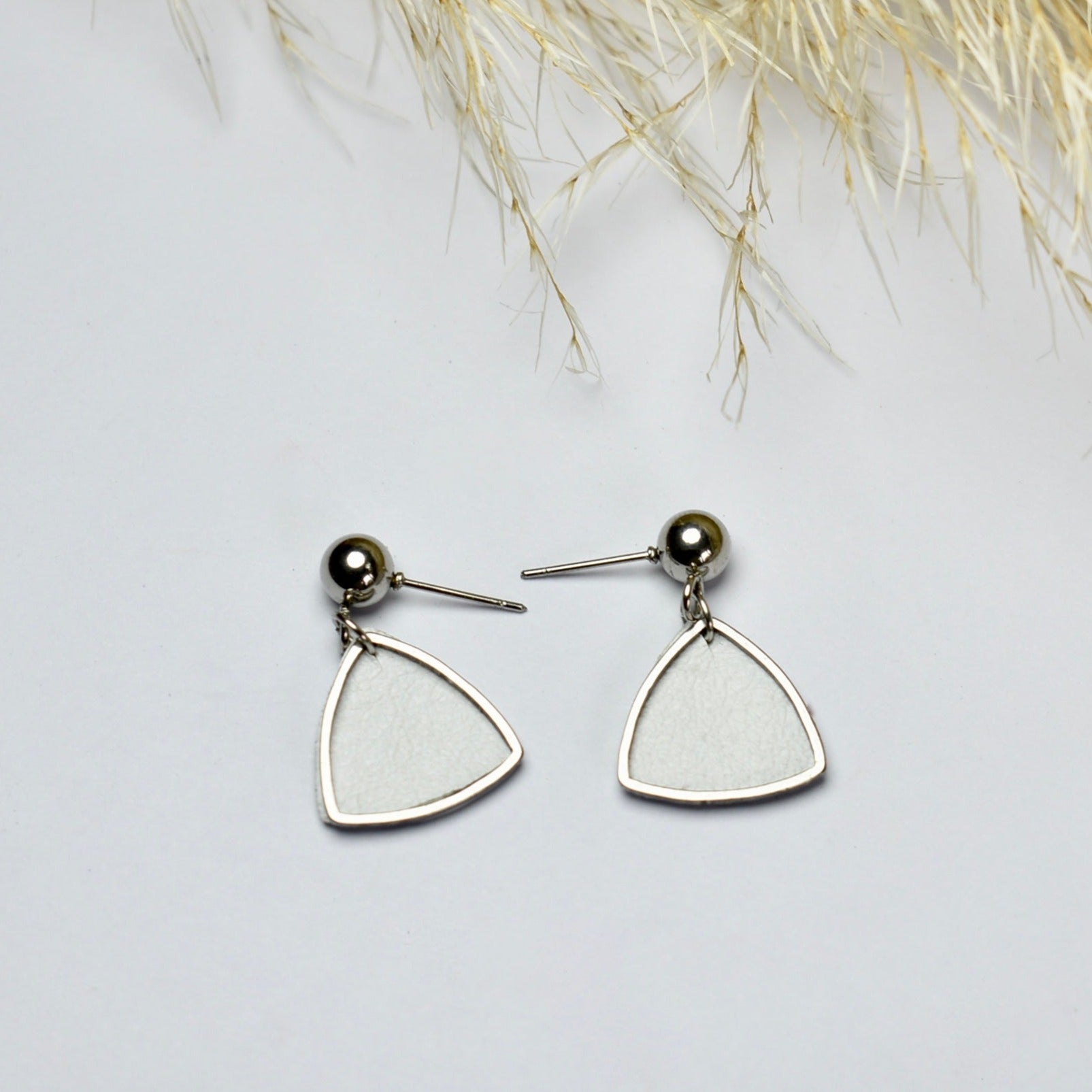 Handmade, light weight and comfortable to wear all day long leather earrings. All our earring hooks are made with a high quality stainless steel and they are hypo allergenic.  They will not tarnish or irritate your sensitive skin.