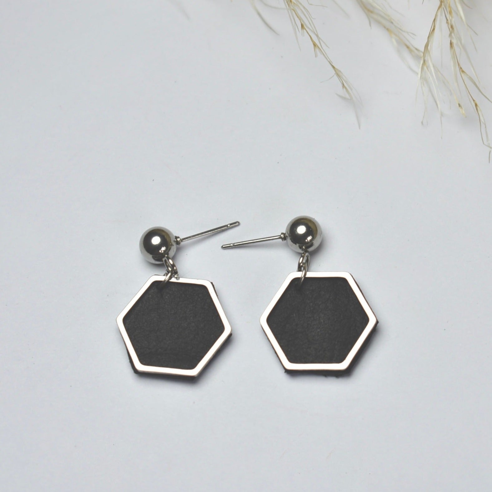 Handmade, light weight and comfortable to wear all day long leather earrings. All our earring hooks are made with a high quality stainless steel and they are hypo allergenic.  They will not tarnish or irritate your sensitive skin.