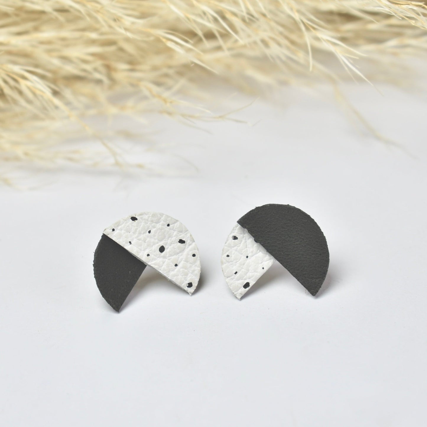 Handmade, light weight and comfortable to wear all day long leather earrings. All our earring hooks are made with a high quality stainless steel and they are hypo allergenic.  They will not tarnish or irritate your sensitive skin.