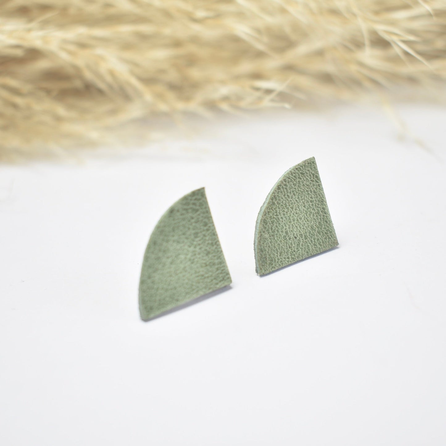 Handmade, light weight and comfortable to wear all day long leather earrings. All our earring hooks are made with a high quality stainless steel and they are hypo allergenic.  They will not tarnish or irritate your sensitive skin.