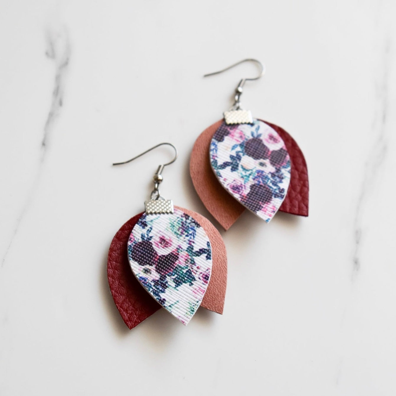 Handmade, light weight and comfortable to wear all day long leather earrings. All our earring hooks are made with a high quality stainless steel and they are hypo allergenic.  They will not tarnish or irritate your sensitive skin.