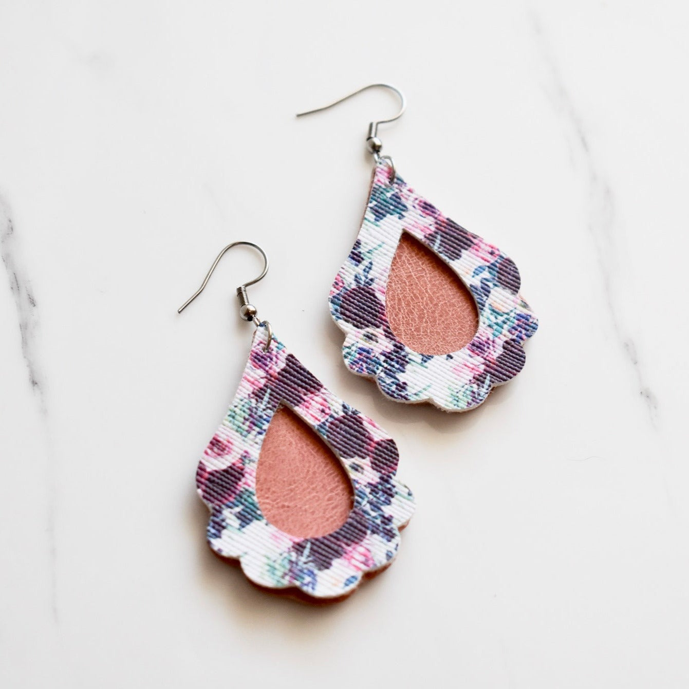 Handmade, light weight and comfortable to wear all day long leather earrings. All our earring hooks are made with a high quality stainless steel and they are hypo allergenic.  They will not tarnish or irritate your sensitive skin.