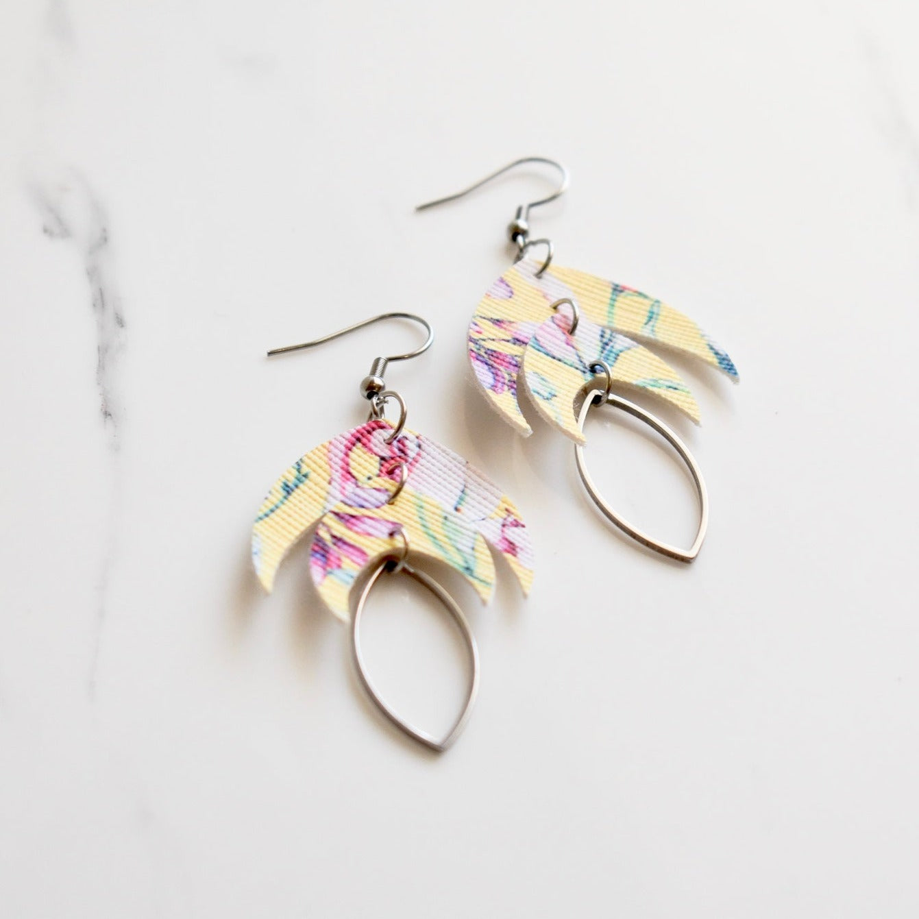 Handmade, light weight and comfortable to wear all day long leather earrings. All our earring hooks are made with a high quality stainless steel and they are hypo allergenic.  They will not tarnish or irritate your sensitive skin.