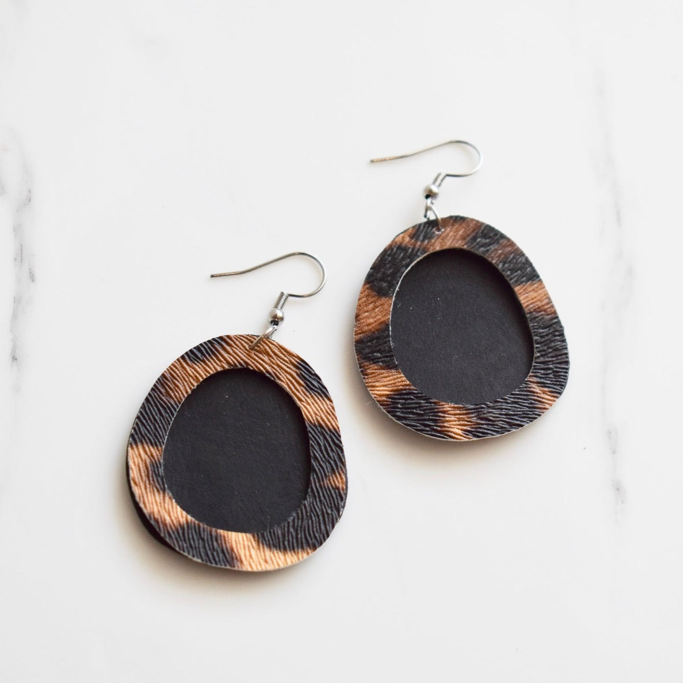 Handmade, light weight and comfortable to wear all day long leather earrings. All our earring hooks are made with a high quality stainless steel and they are hypo allergenic.  They will not tarnish or irritate your sensitive skin.