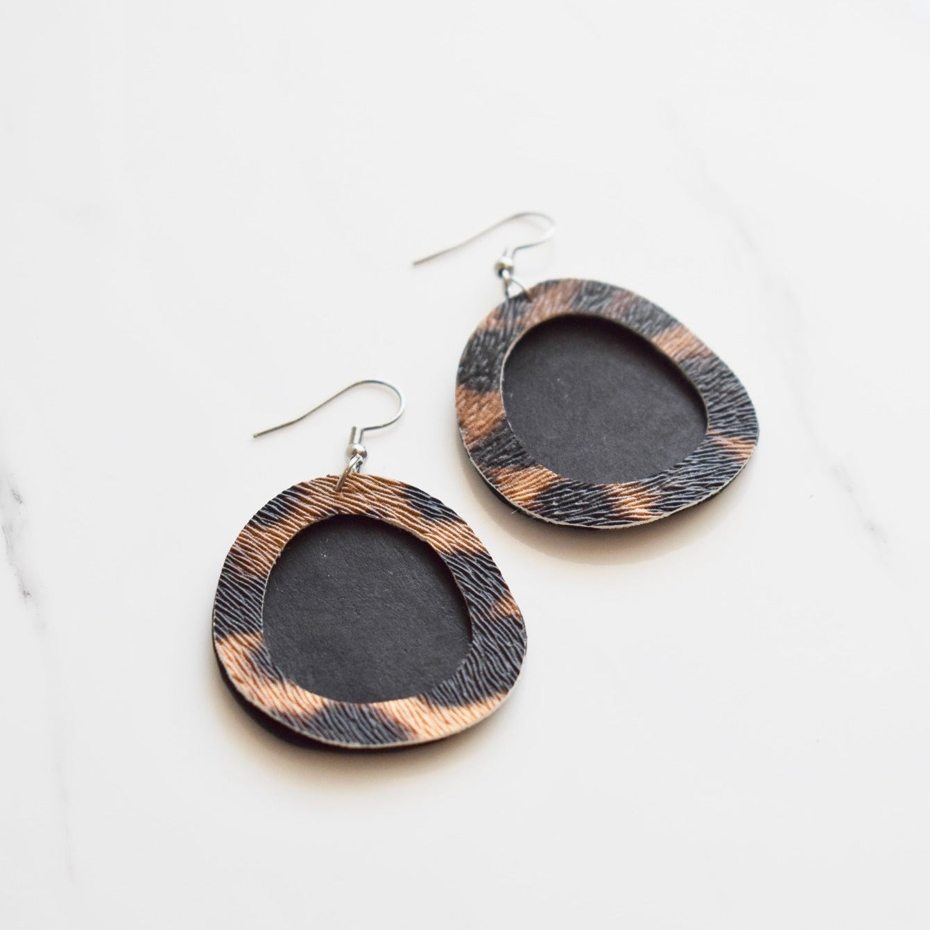 Handmade, light weight and comfortable to wear all day long leather earrings. All our earring hooks are made with a high quality stainless steel and they are hypo allergenic.  They will not tarnish or irritate your sensitive skin.