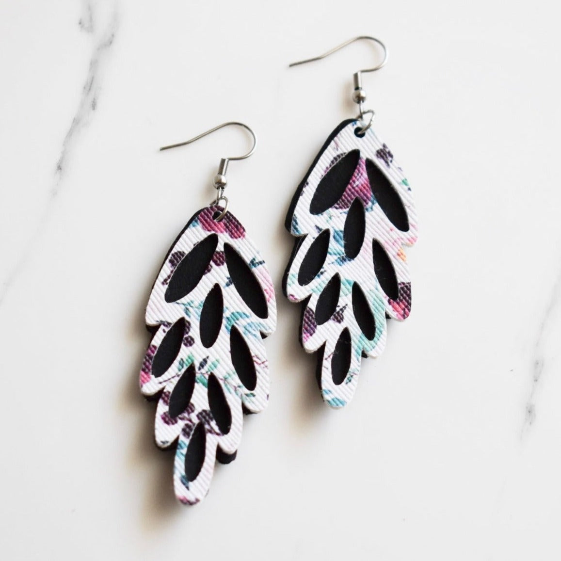 Handmade, light weight and comfortable to wear all day long leather earrings. All our earring hooks are made with a high quality stainless steel and they are hypo allergenic.  They will not tarnish or irritate your sensitive skin.