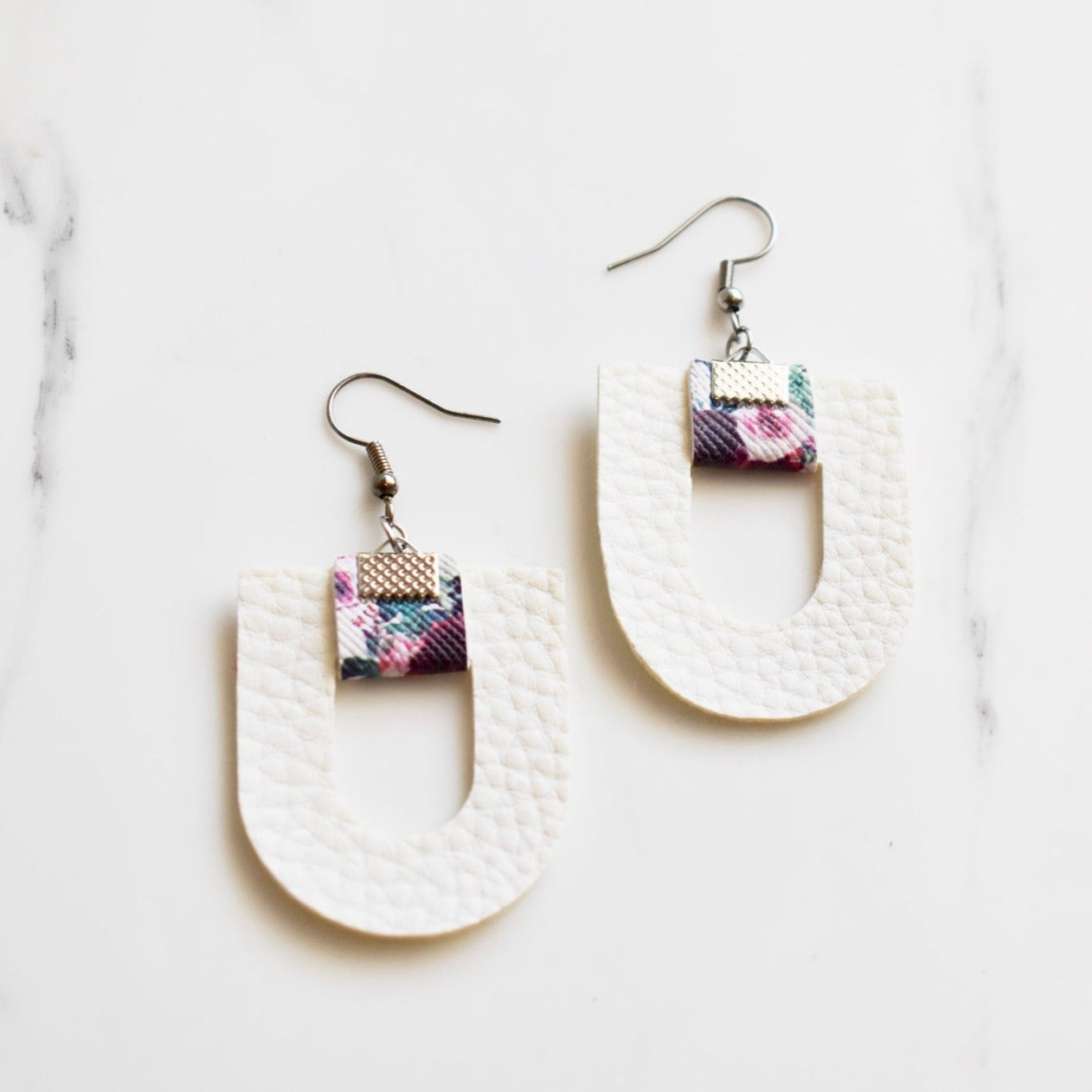 Handmade, light weight and comfortable to wear all day long leather earrings. All our earring hooks are made with a high quality stainless steel and they are hypo allergenic.  They will not tarnish or irritate your sensitive skin.