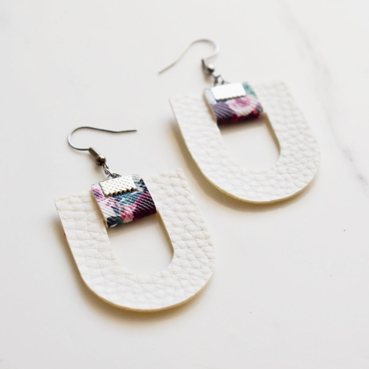 Handmade, light weight and comfortable to wear all day long leather earrings. All our earring hooks are made with a high quality stainless steel and they are hypo allergenic.  They will not tarnish or irritate your sensitive skin.