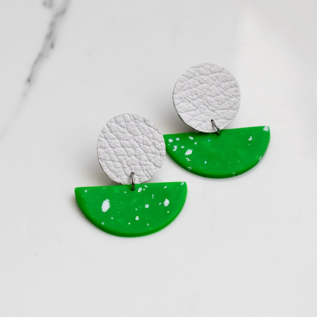 Handmade, light weight and comfortable to wear all day long leather earrings. All our earring hooks are made with a high quality stainless steel and they are hypo allergenic.  They will not tarnish or irritate your sensitive skin.