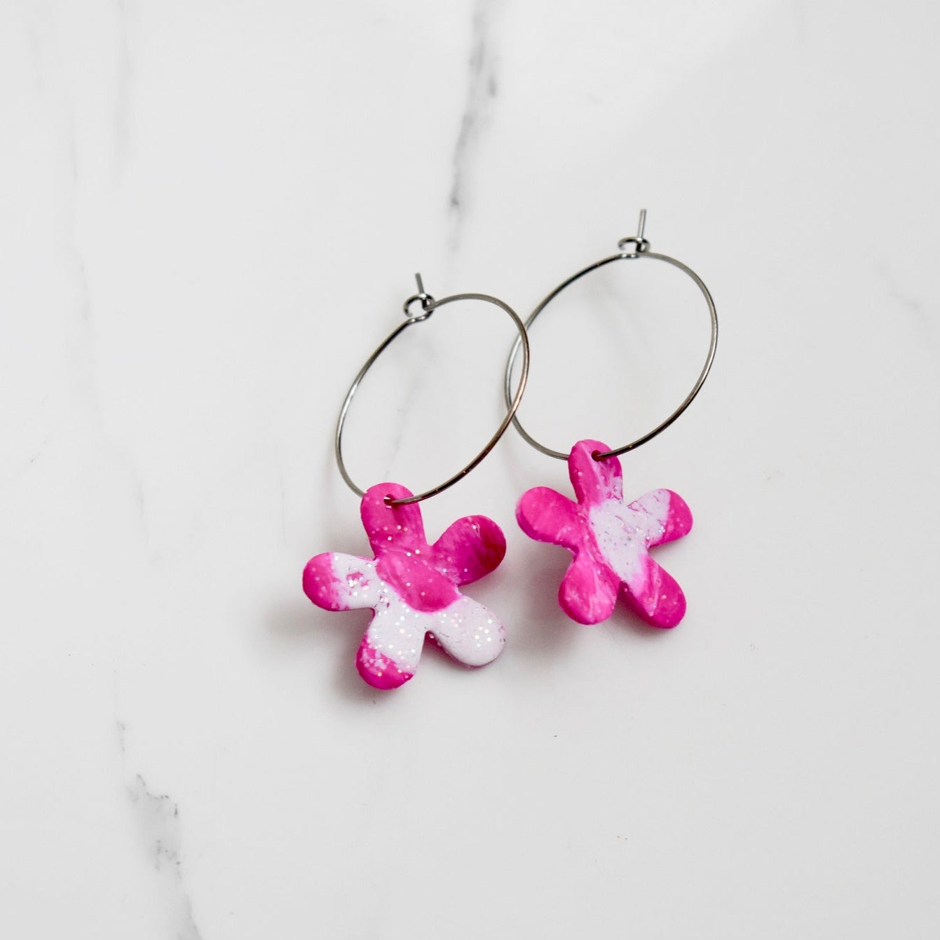 Handmade, light weight and comfortable to wear all day long stainless steel earrings. All our earring hooks are made with a high quality stainless steel and they are hypo allergenic.  They will not tarnish or irritate your sensitive skin. They are also WATERPROOF!